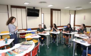 Oficina de Caixinhas. Carmen Mesquita, Servidora